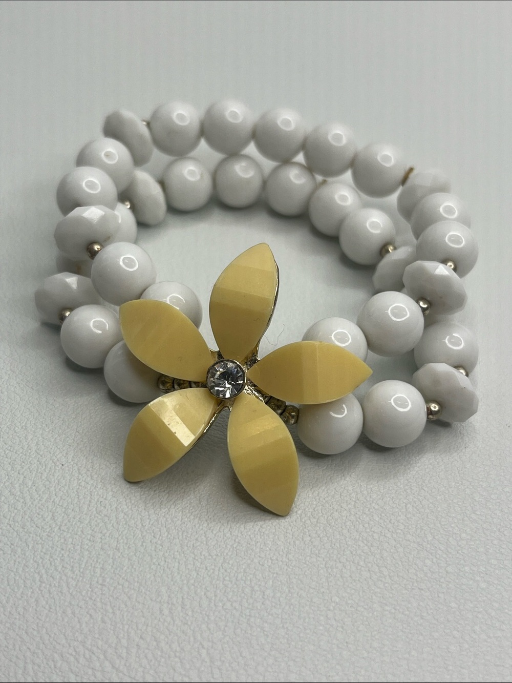 White Beaded Stretch Bracelet with Yellow Flower Accent